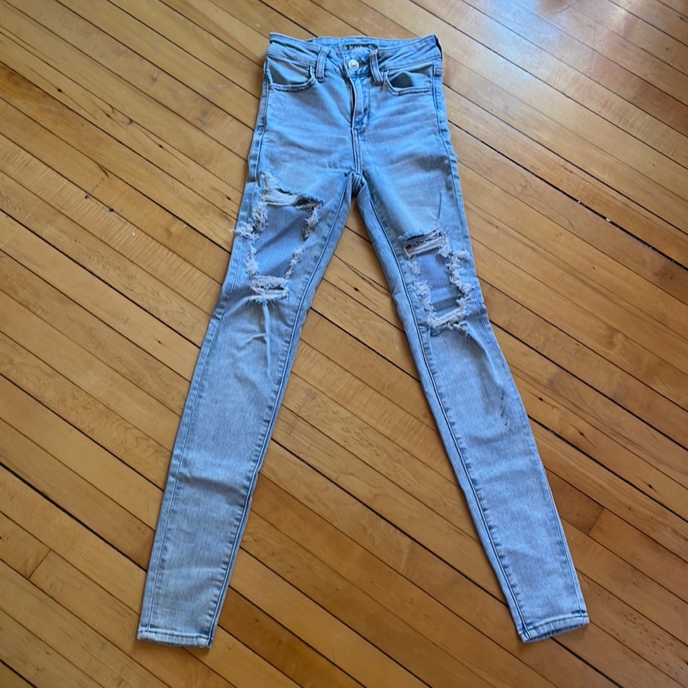 Blue ripped skinny jeans